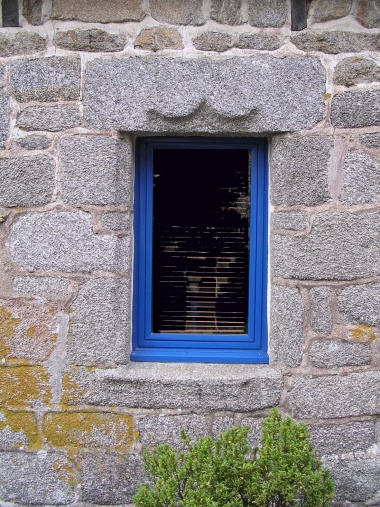  La fenêtre accolade de la petite maison 